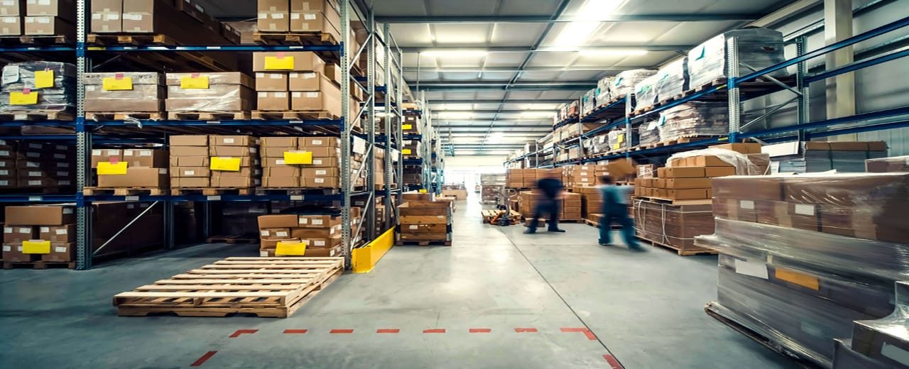 Warehouse aisle with racked inventory